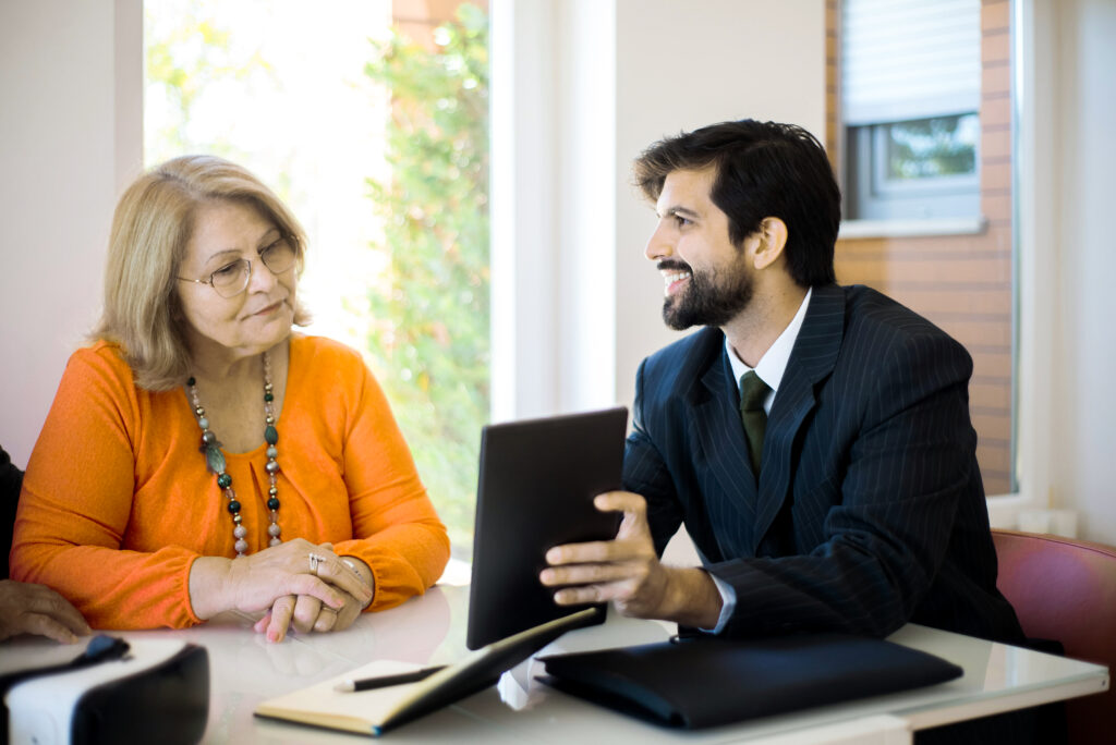 A PE consulting expert happily advises a client on their investment thesis development.