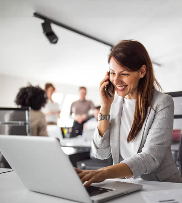 A female private equity firm executive on the phone with an expert network to find a PE advisor