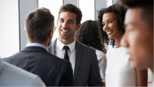 group of business people mingling and chatting